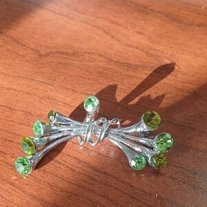 Elegant Silver and Green Brooch